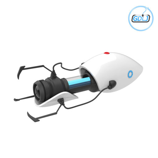 3D printed Portal Gun model in gray and white plastic, assembled and displayed on a desk